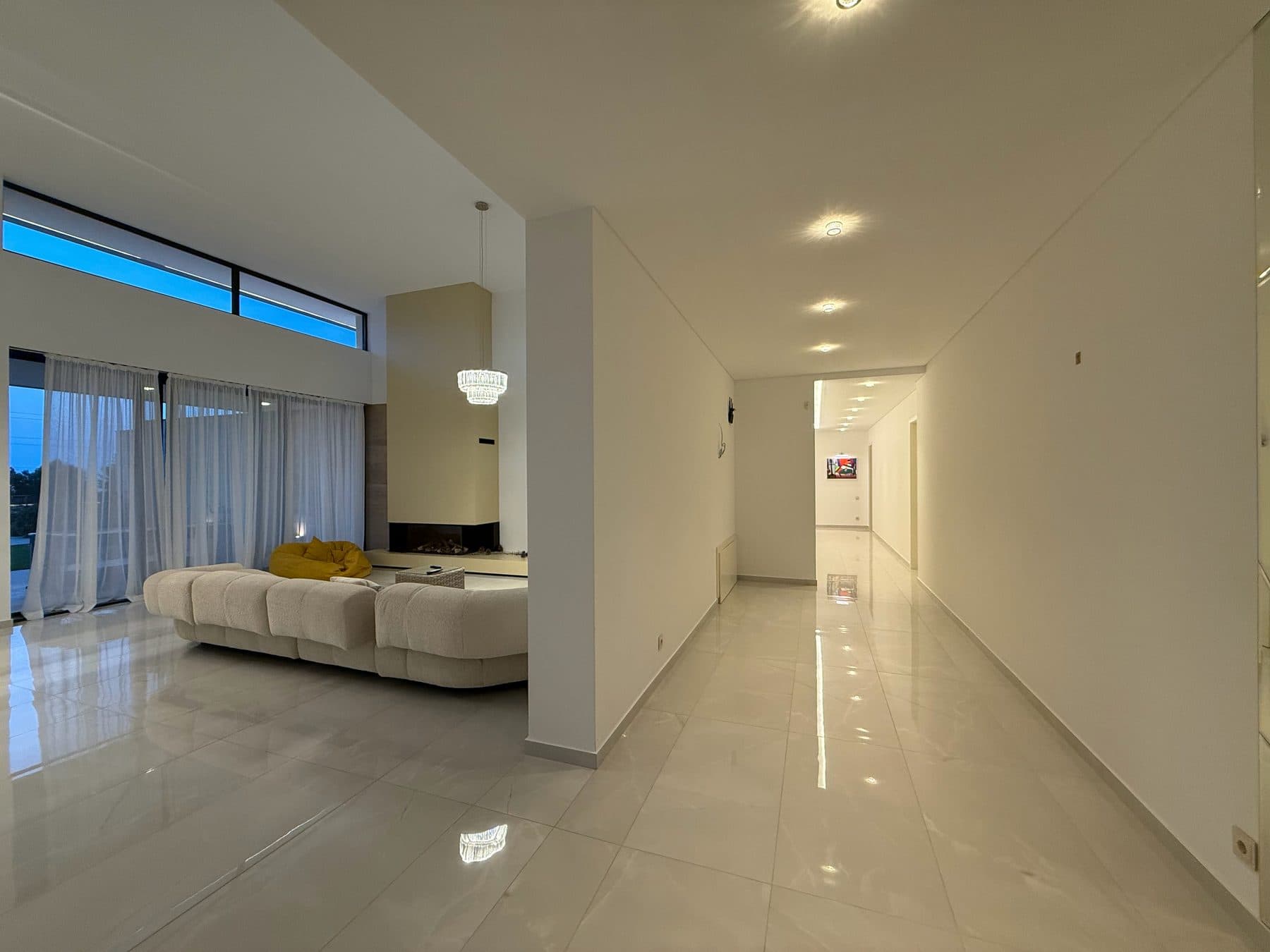 The living room, and the gallery that runs on from it.