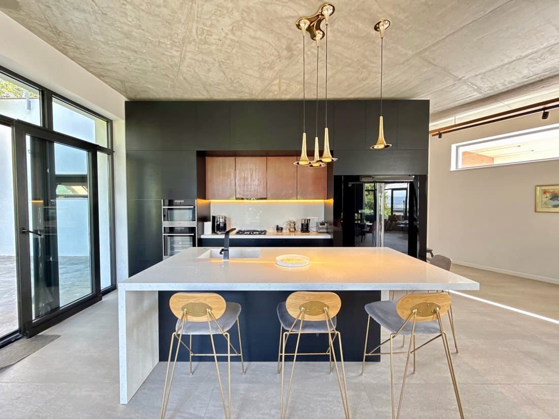 The kitchen, open to the main living floor.
