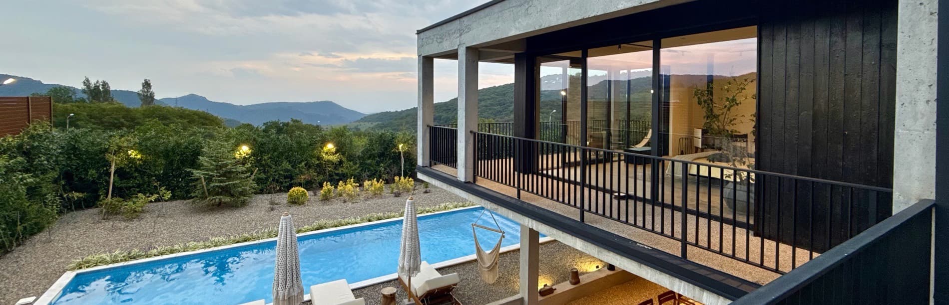 The pool and the hills beyond, from the upper balcony.