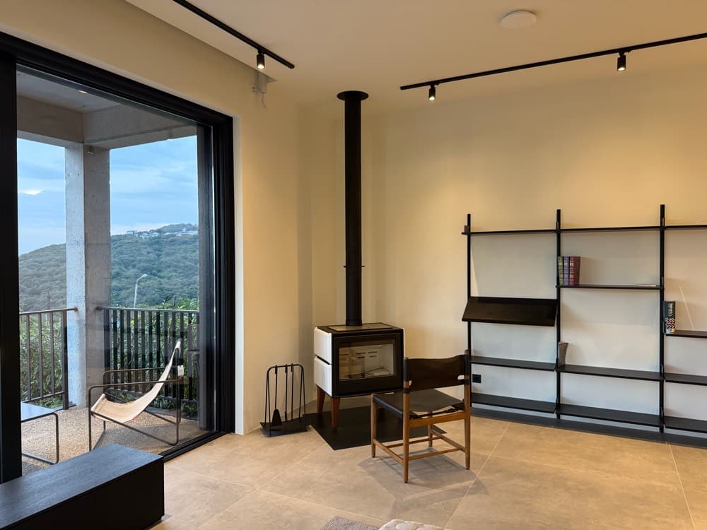 A wood-burning stove, facing the view.